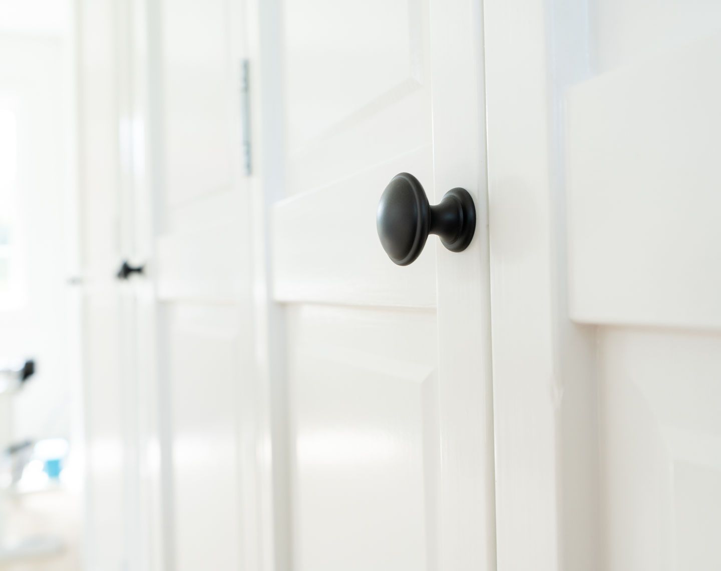 Elegant Interior Remodel with Wainscoting with Brass Chandelier in Bellevue, WA